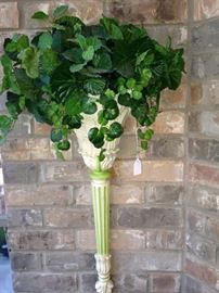 Wall sconce with greenery