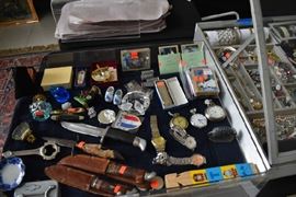 Knives Schrader, Western Field and a Buck.  Pocket watches, Elgin antique watch is an  with a train picture overlay with copper on silver. Baseball cards and memorabilia.