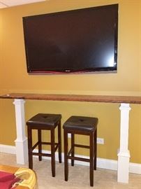 Bar stools. Flat screen TV NOT FOR SALE. 