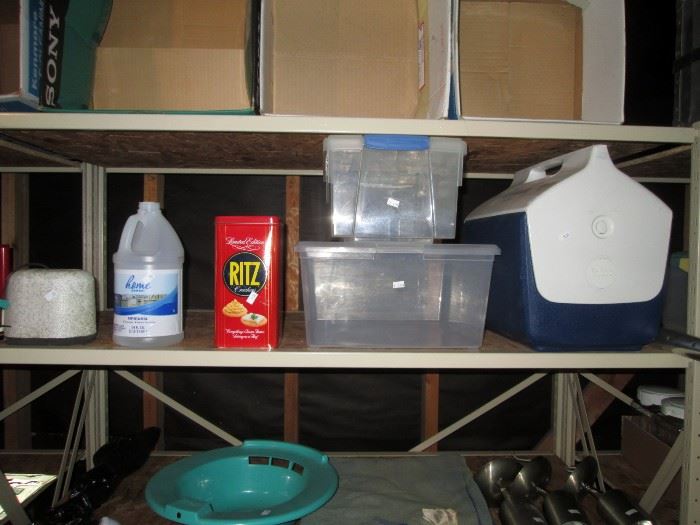 Garage:  Igloo Cooler, Storage Bins, Tin, Faucet Cover 