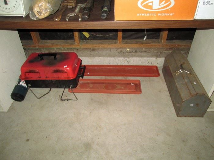 Garage:  Small Grill, Plant holders, Tool box