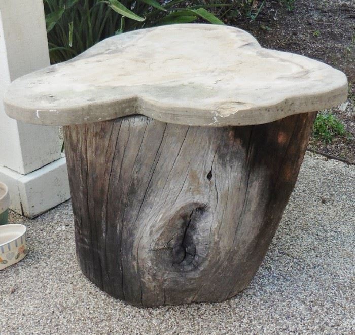 A second tree stump table with free form concrete top
