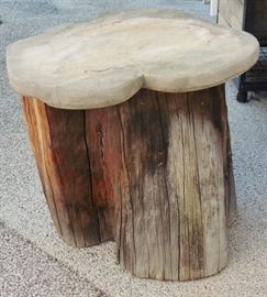 Tree stump table with free form concrete top