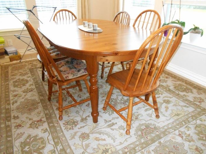Beautiful high end rug and exquisite wooden breakfast set!