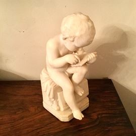 Carved alabaster figure. 