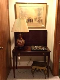 Mahogany game table, with large lithograph.