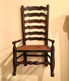 Very early 19th century ladder back arm chair.