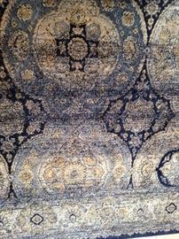 8 feet x 11 feet rug in shades of blue