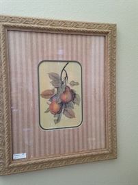 One of four framed fruit pictures