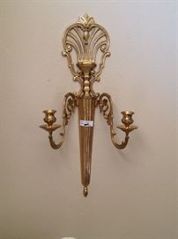 One of two matching wall sconces