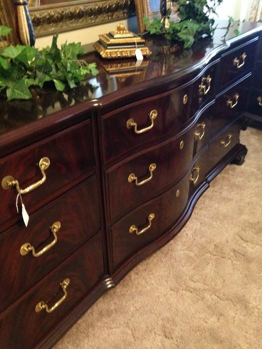 Beautiful triple dresser matches the nightstands, chest, and armoire.