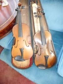 Violin to the right of picture. Inside Paper Label that reads : Stradivarius Antonias Made in USA. Copy. ANNO17 Cremonenis. Faciebate 