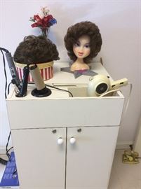 Hair Salon Cabinet, curling irons, hair dryers, many wigs