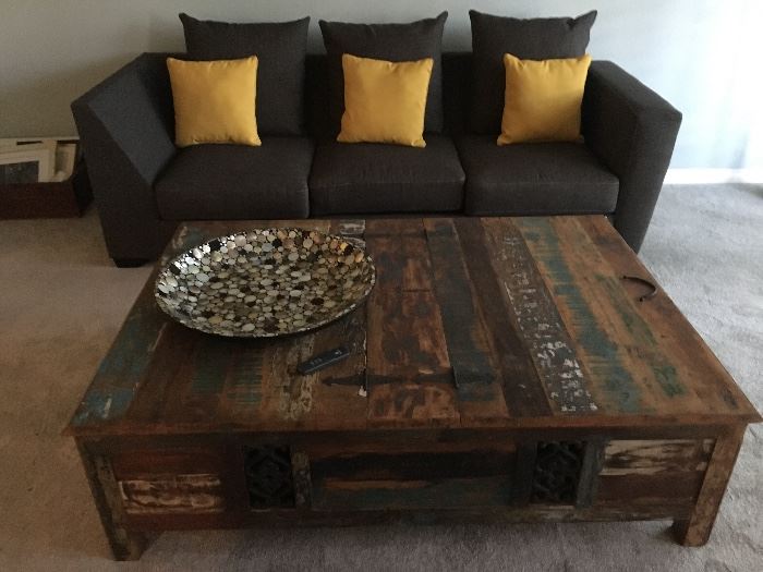 (Platter not for sale).  Indonesian table with two hinged doors, inside trunk space great of storing! Repurposed multi colored exotic woods make this a beautiful and amazing piece!
