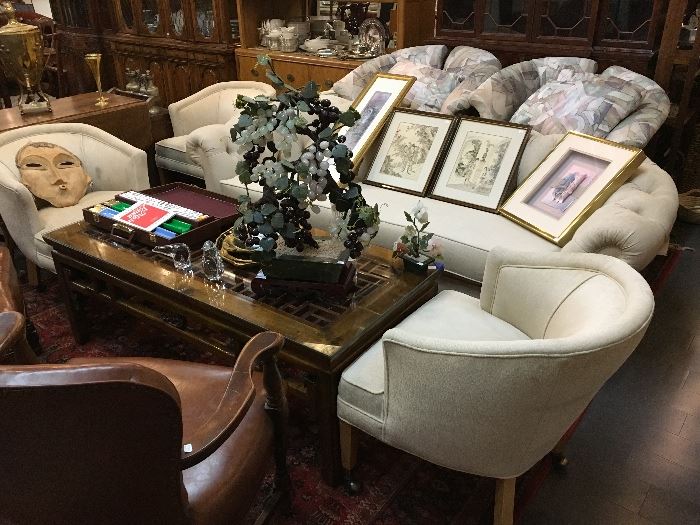 4 white upholstered chairs on wheels, jade tree, labyrinth coffee table