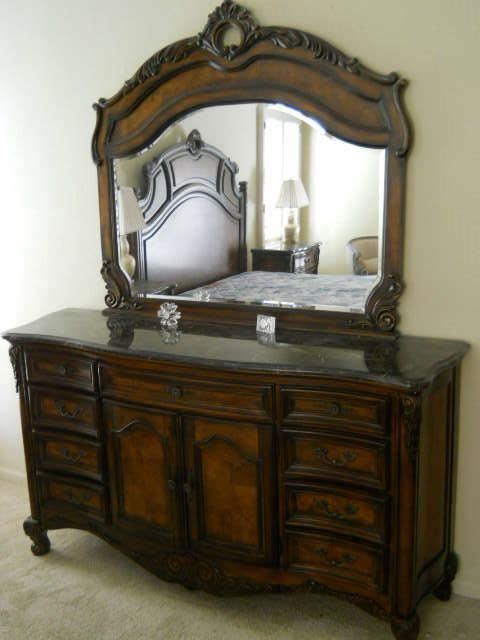 Ladies dresser with marble top and beveled mirror