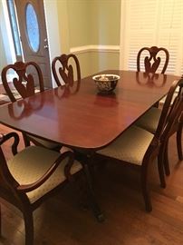  Mahogany dining room table with six chairs 