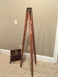 This is an antique transistor level with tripod..