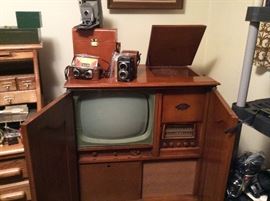 Magnavox tv, radio, record player with album storage.  Circa 1950’s