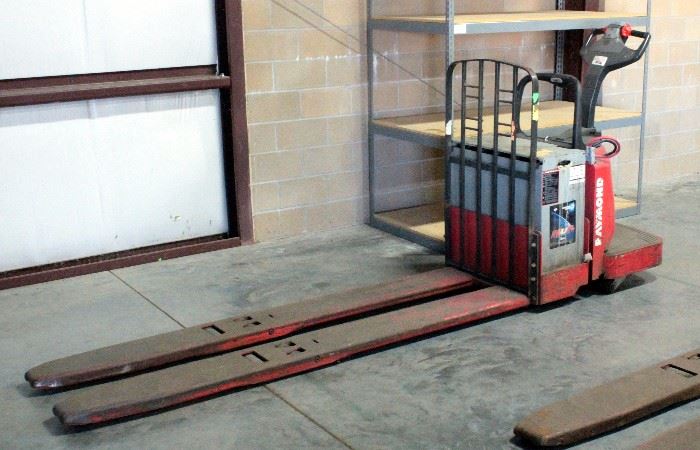 Raymond Model 8400 Ride Along Electric Pallet Jack Truck, 8 Foot Forks, 6000 Lbs Capacity, 24V, 1889 Hours, SN# 840-09-81565
