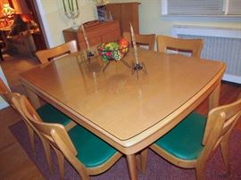 Heywood Wakefield Extension Dinning Table with 2 Leafs and 6 Dogbone Chairs(original upholstery). 