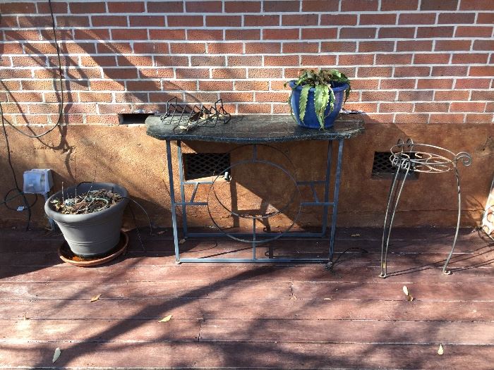  Fabulous patio and yard art
Iron &  granite table