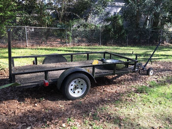 51/2  feet wide 10 feet long w/fold down back gate trailer w/pulling Dollie & chucks  & spare tire
WILL NOT BE 1/2 PRICE ON 2nd DAY