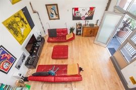 Lignet Roset sofa set, 1940s wood buffet, various art. Some other items shown may or may not be for sale.