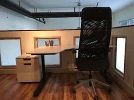 IKEA desk, rolling file cabinet, and office chair.