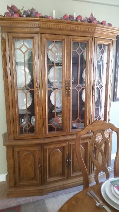 This stately China Cabinet has the space and traditional design you need for your formal dining room. Both the china cabinet , table and chairs were purchased in Nappanee, Indiana .  This area is known for its fine furniture.
