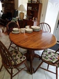 Oak table and chairs with additional leaf