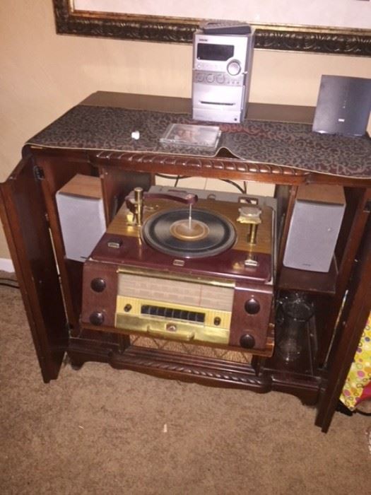 Victrola vintage radio/ turntable, closed up to just a cabinet