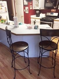 Two vintage kitchen stools