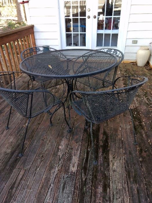 Outdoor table and 4 chairs set.  Chairs are rounded and so comfortable!