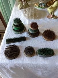 One of my favorites!! Great vintage flower frogs. I love displaying pictures in these.