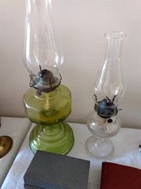 Two oil lamps...love the green glass!