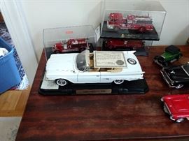 Many collectible cars.