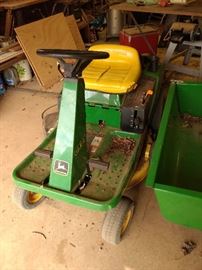 Riding mower with cart! AS OF RIGHT NOW IT IS NOT RUNNING!! If we get it up and running I'll make sure to post it!!
