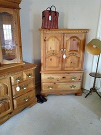 This is the matching armoire. It's missing a handle on one of the drawers.