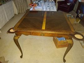 Wonderful game table with built in coasters!