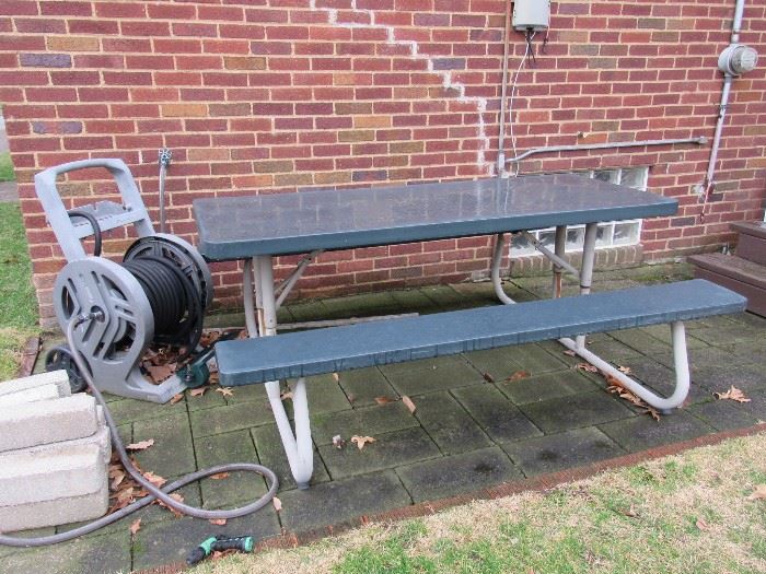 Outdoor Picnic Table, Hose and Reel, also empty Kegs