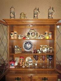 Ethan Allen Hutch. Also pictured is my German display just some of the German items in sale. Castles On The Rhine Tureen Cider/Punch Bowl Set Of 7, Gerz West Germany Steins, Original King Stoneware, Vintage Decorative Trinket Box, Goebel (Box & Certificate), Set of 6 Vintage Beautiful Romer Different Colored 30% Lead Crystal Stem Glasses From West Germany, Schmid Figurines