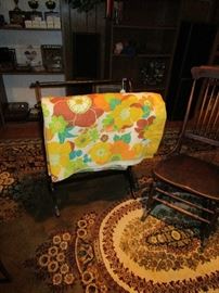 Quilt rack with a vintage blanket .You can also see a Older huge rug that will be for sale in this picture.