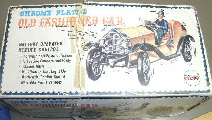 VINTAGE BATTERY OPERATED CHROME PLATED OLD FASHIONED CAR