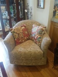 swivel chair, curio, decoratives, pillows
