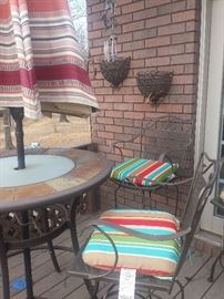 patio table, umbrella, 3 stools