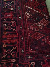10 feet x 13 feet rug in red, white, and black