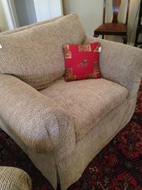 One of two matching comfy chairs