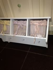White wall shelf with basket and hanging organization