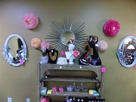 Fun Joan Rivers necklace. Feather hat.